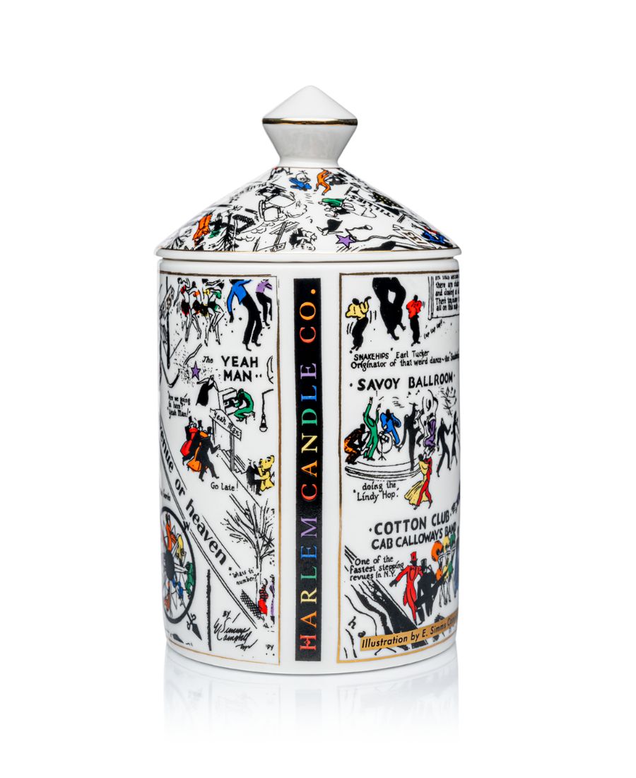 This is an image of our night club map of Harlem candle in black-and-white with pops of color. This candle has a dome lid and is Fragrance with the Langston scent.  This is the opposite side of the candle that shows the Harlem Candle Company words with red, orange, yellow, green, blue, purple colors