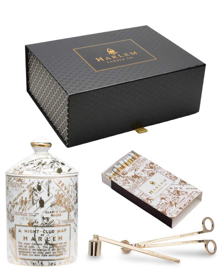 Image of the Speakeasy Ceramic Gold gift set with Harlem Candle Co branded Wick Trimmer and Candle Snuffer set.  The box also includes the gold and white Nightclub Map of Harlem matches.